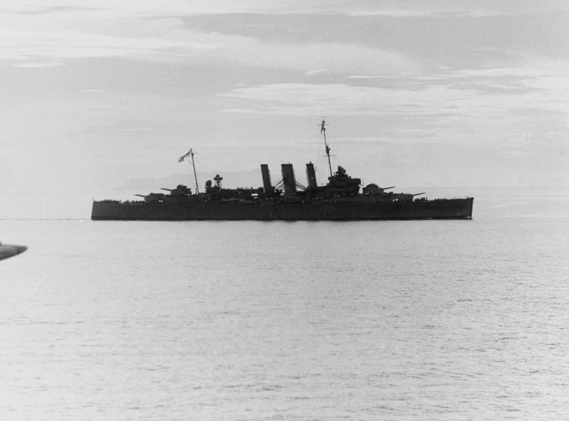HMAS Australia (D84) underway off the north shore of Guadalcanal on August 1942