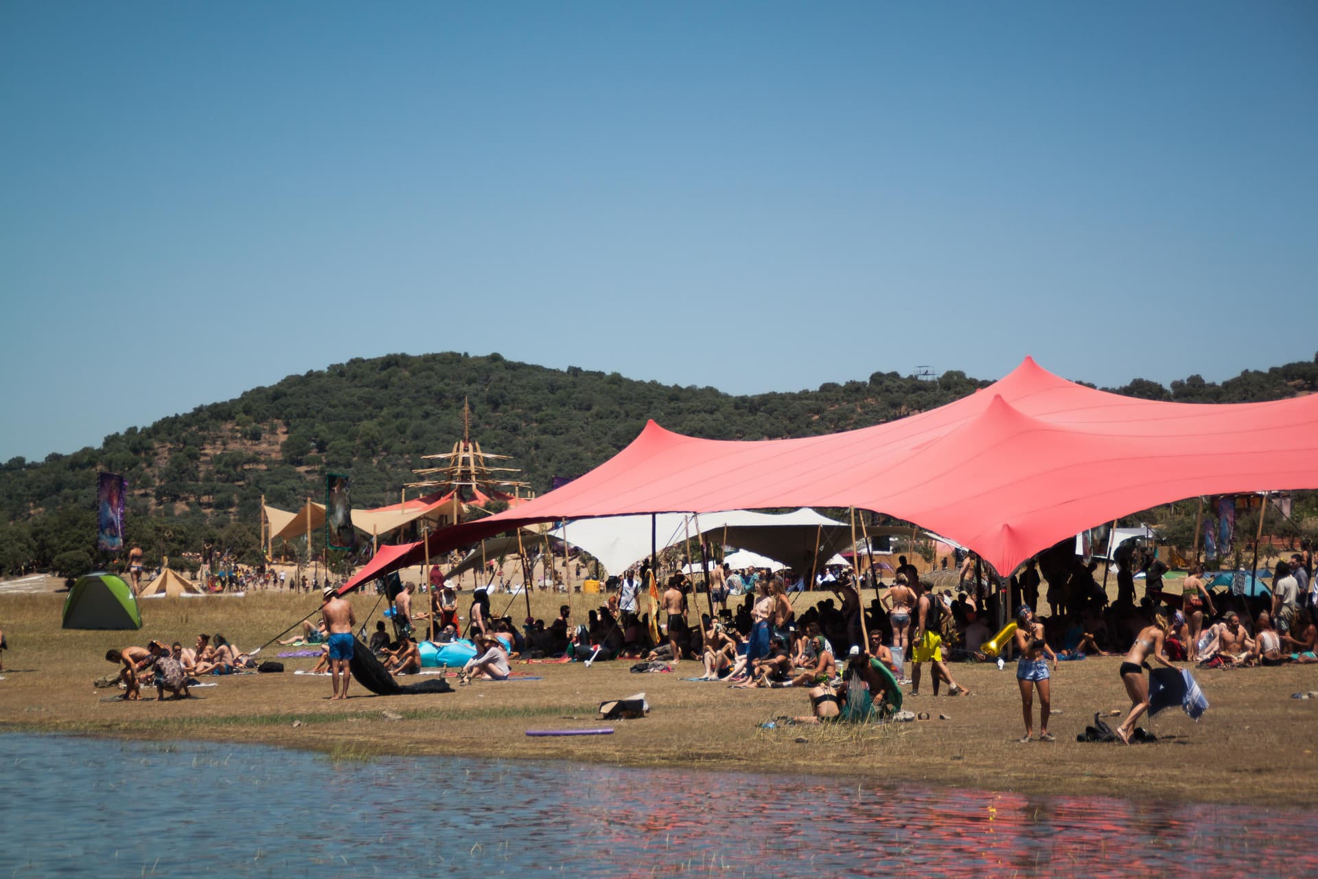Pink shade sails above the beach