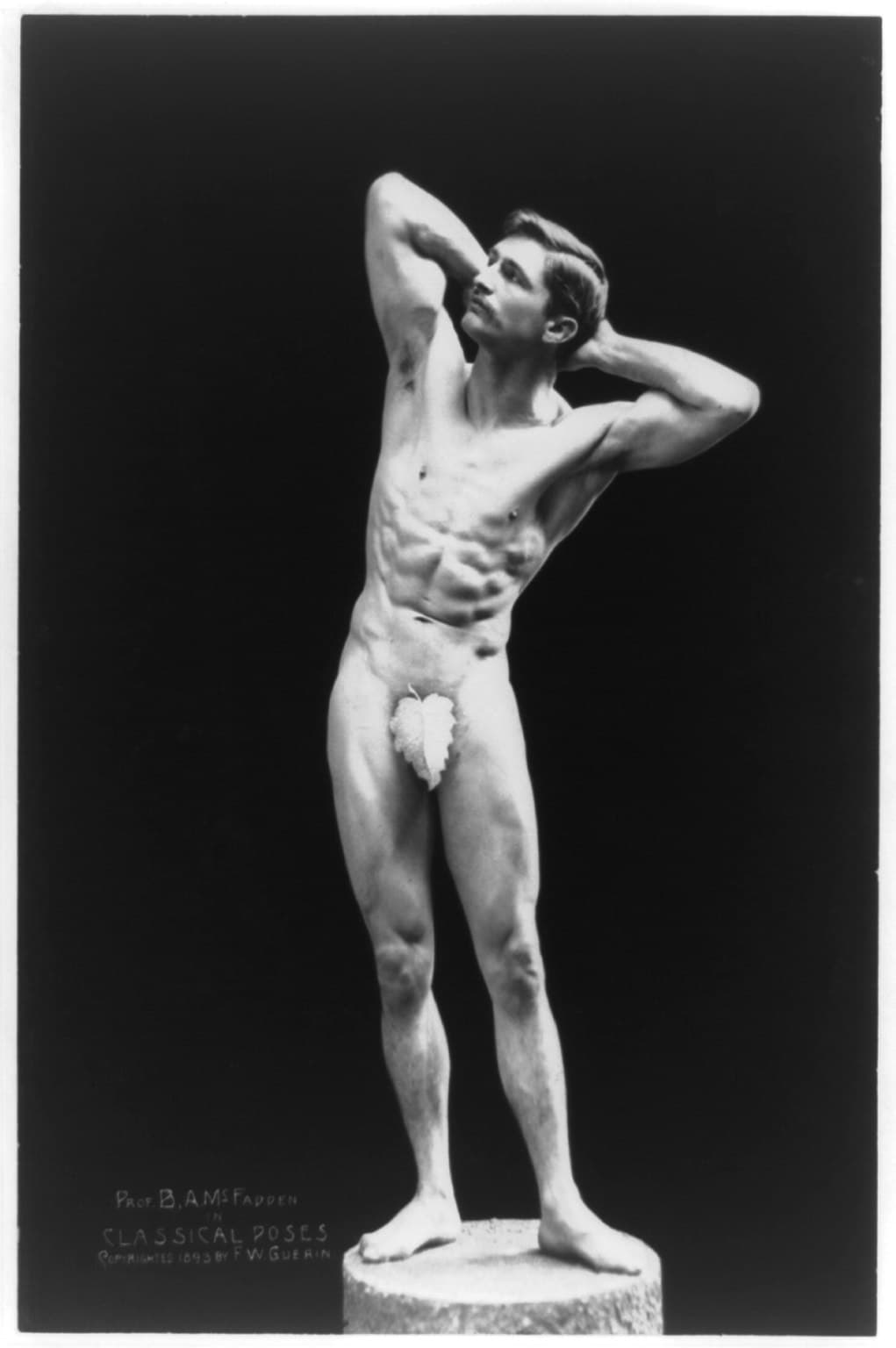 Bernarr Macfadden with hands behind his head