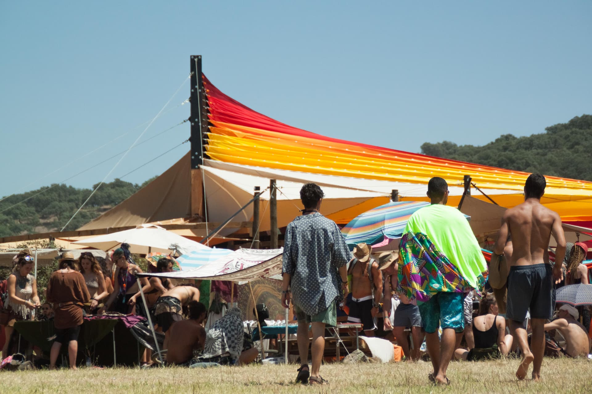 Striped canopy over the daytime crowd