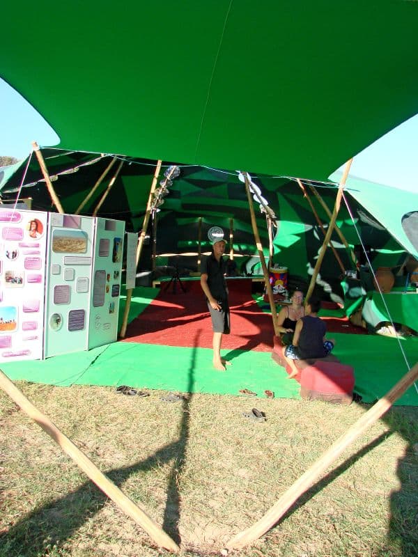 Green tensile canopy over an information stand