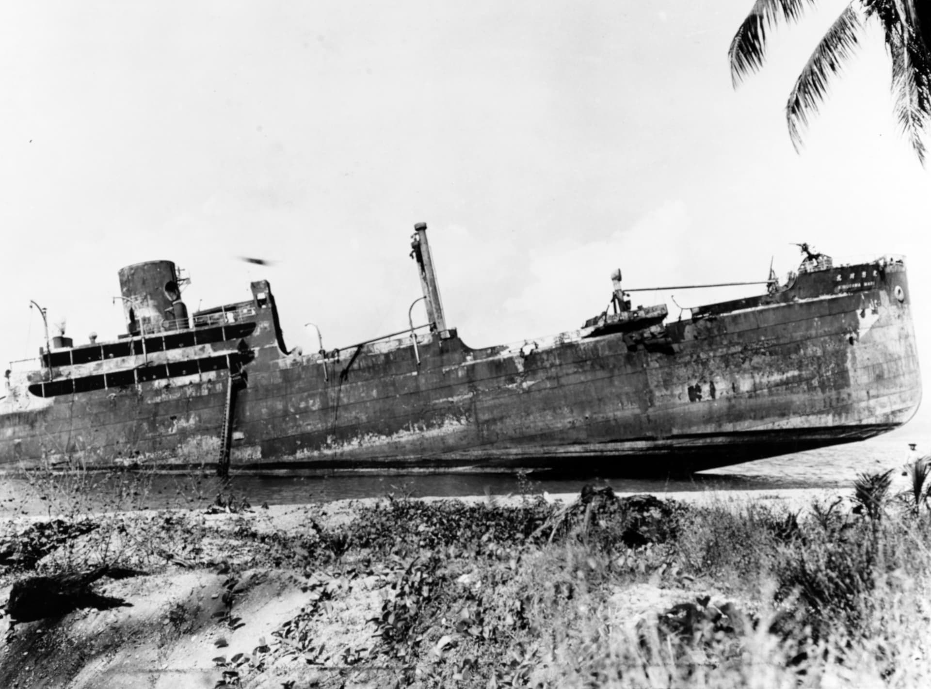 Japanese transport Kinugawa Maru beached and sunk on Guadalcanal, photographed in 1943-1944 (NH 74773)